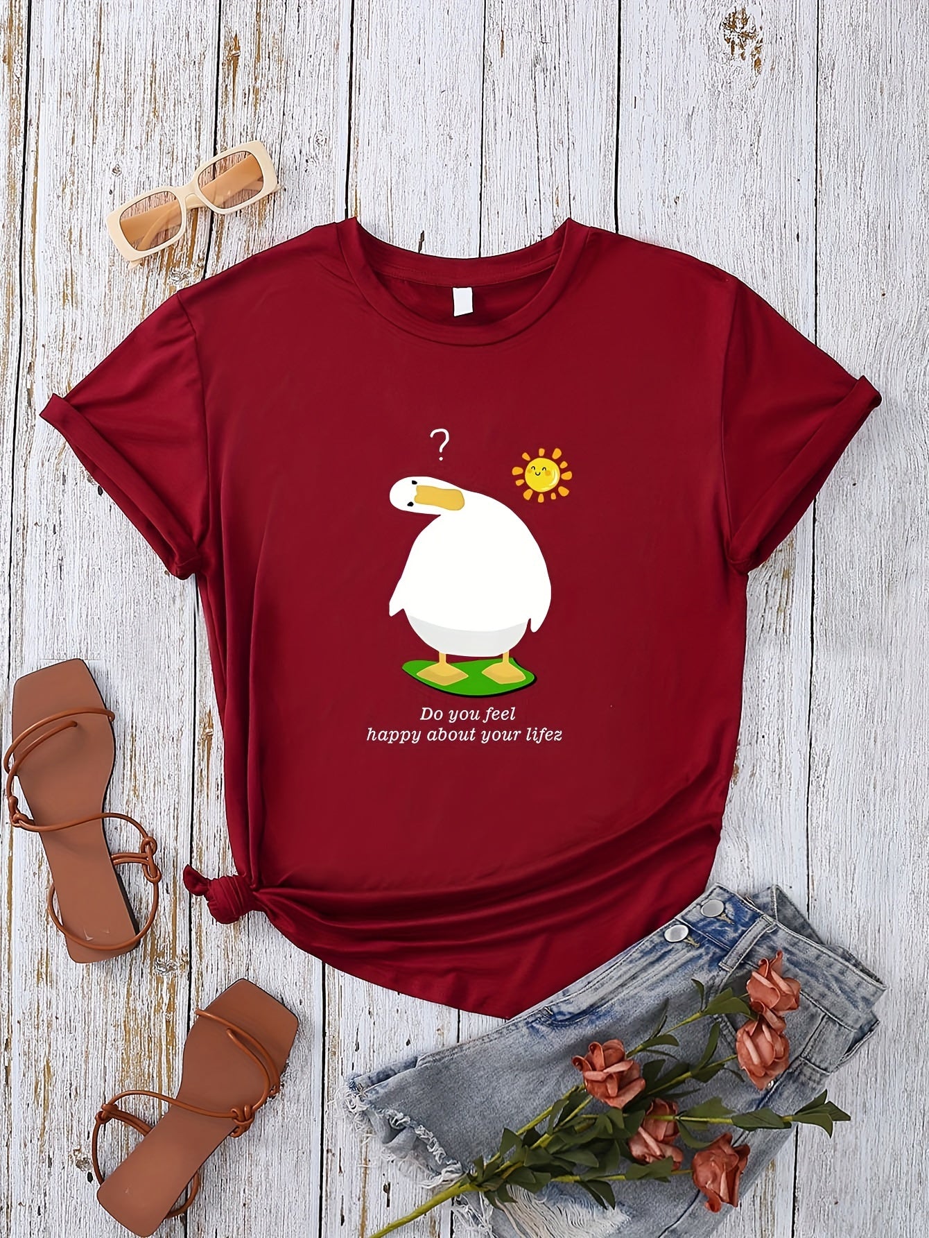 Introducing the Cute and Quirky Goose Letter Print Summer T-Shirt! This top is a must-have for any stylish woman. The soft and lightweight fabric makes it perfect for summer days, while the goose letter print adds a unique touch. With its comfortable and classic crew neck design, this top is perfect for any casual occasion. Get yours today!