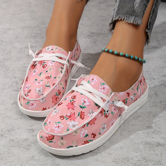 Add a classic, feminine look to your wardrobe with the Blooming Elegance Women's Floral Print Canvas Shoes. These slip-on flat sneakers feature a floral print upper with a durable rubber sole, providing superior comfort and slip resistance.