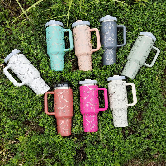 This 40oz stainless steel tumbler will keep drinks cold or hot for up to 12 hours and is conveniently portable for car, home, office, or travel use. With a cow head pattern and a lid and straw, this tumbler makes an ideal summer drinkware solution and a thoughtful and practical birthday gift.