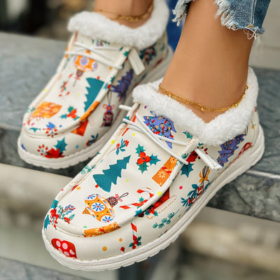Celebrate the season in style with Festive Comfort women's Christmas print canvas shoes. These stylish sneakers feature a plush lining for comfort and casual style, and the festive holiday print will have you ready for a fun winter.