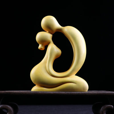 Intertwined Love: Exquisite Boxwood Couple's Carving - A Symbol of Eternal Togetherness