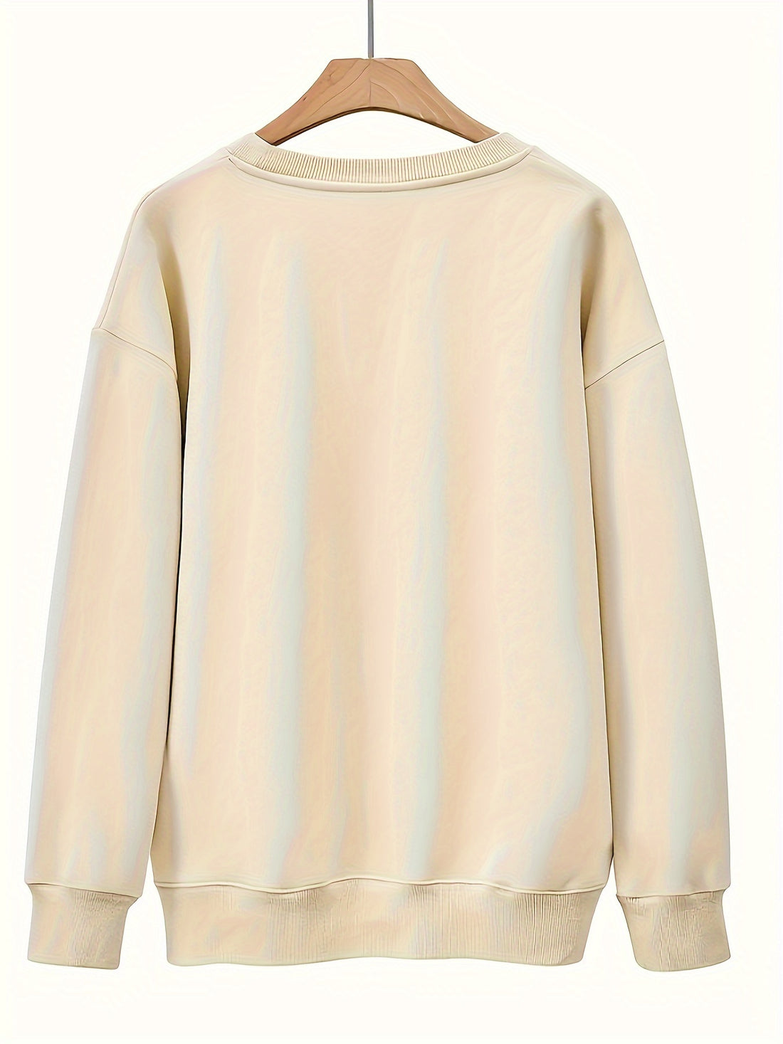 This women's sweatshirt is the perfect addition to your casual wardrobe. Featuring a chic and playful letter print, it adds a touch of personality to any outfit. With long sleeves, it's suitable for any season. Make a stylish statement with this trendy and comfortable sweatshirt.