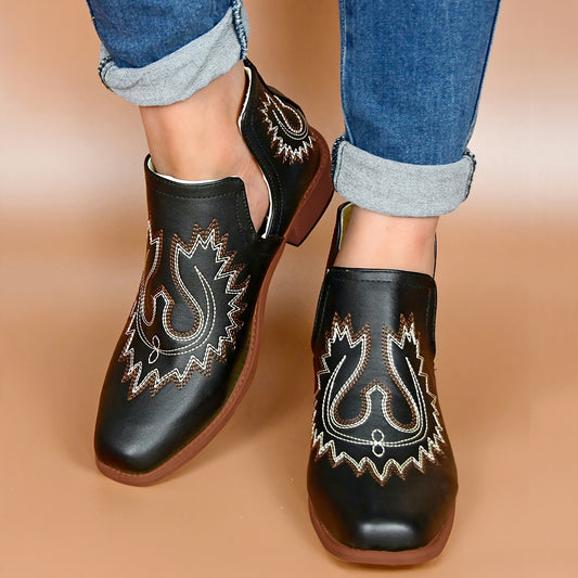 These stylish Cowboy Boots have a retro cut-out design and a square toe with a 1" chunky low heel. Crafted with sturdy leather and featuring embroidered detailing, these boots offer a classic look with modern touches.Step out in style with these retro cut-out short boots. Crafted with a classic square toe and chunky low heel, these embroidered cowboy boots offer superior comfort and support. With a 3.5 cm heel, you can stay on trend with an effortless look.