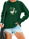 This Women's Loose Sweatshirt is made of a comfortable cotton blend that is perfect for the season. The front features a cute duck print with lettering, perfect for casual everyday wear. Enjoy easy movement with the loose fit and long sleeves.