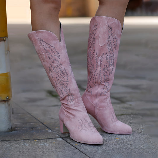Look fabulous in these stylish women's embroidered cowboy boots. Featuring a point toe, chunky heel and side zipper, they provide comfort and mid-calf protection without compromising on style. Perfect for everyday or vacation wear.