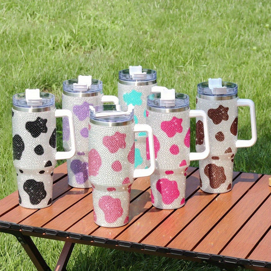 This 40oz stainless steel tumbler is perfect for car, home, office, and travel use. With its rhinestone design and cow pattern, it adds a stylish and modern touch to any occasion. The included lid and straw offer both convenience and portability, making this a great gift for any occasion.