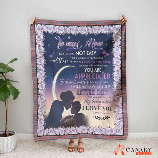 Make Mom feel special with this luxurious Under The Moon Blanket. This product is a perfect gift for Mother's Day and is crafted with the highest quality materials. Featuring a beautiful design of the moon, it guarantees superior warmth and comfort. Snuggle up and let Mom know she's appreciated.