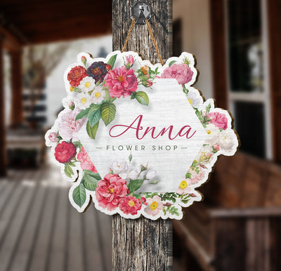 Grow your flower shop's presence with a personalized, wooden sign. This sign is the perfect way to display the name of your florist shop, ensuring that customers and passers-by recognize your brand. With its classic design and sophisticated style, this sign will make a great addition to your storefront.