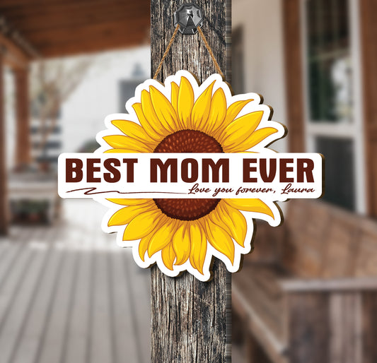 This custom wood sign is perfect for celebrating Mom on any special occasion. Add your custom name and a beautiful sunflower design to create a one-of-a-kind gift that reflects her uniqueness. Durable and lightweight plywood ensures a long-lasting keepsake.