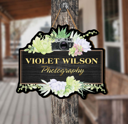 This personalized sign features a custom wooden design created to bring an air of sophistication and elegance to any photography studio. Ready to hang, this sign is sure to make a statement about professionalism and style, allowing your business to stand out from the crowd.