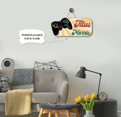 This personalized wooden sign is the perfect addition to any kid's room, giving them a unique and personalized touch. Made from quality wood, this sign is easy to customize with any name or phrase and adds a touch of fun to the room. Ideal for kids who love games, this sign is sure to be a hit.