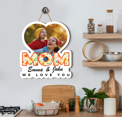 This custom wood sign is a beautiful and lasting way to show your love for Mom! Crafted from premium plywood, it can include a custom photo and name for a truly personal touch. Perfect for Mother's Day, it's the ideal gift to show you care.