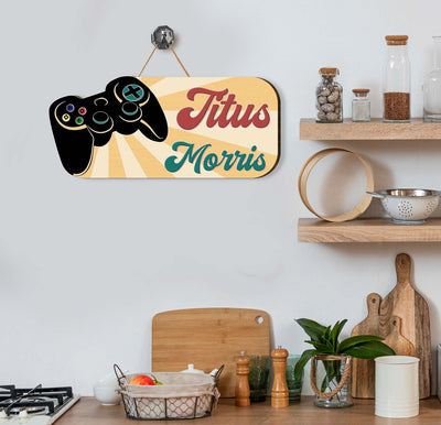 This personalized wooden sign is the perfect addition to any kid's room, giving them a unique and personalized touch. Made from quality wood, this sign is easy to customize with any name or phrase and adds a touch of fun to the room. Ideal for kids who love games, this sign is sure to be a hit.