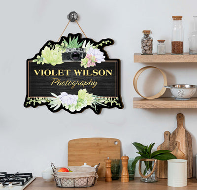 This personalized sign features a custom wooden design created to bring an air of sophistication and elegance to any photography studio. Ready to hang, this sign is sure to make a statement about professionalism and style, allowing your business to stand out from the crowd.