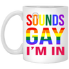 This Sounds Gay I'm In Funny Gay LGBT Pride Rainbow White Mug is a great way to show your support for the LGBTQ+ community. It's a unique gift idea for birthdays, anniversaries, or just to show someone you care! The design includes a rainbow-colored "Sounds Gay I'm In" slogan and a pride flag background. Express your pride with this unique mug!