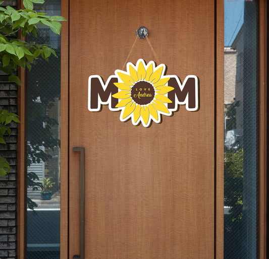 Celebrate Mother's Day with this high-quality, personalized wooden sign. Crafted with a sunflower template, this Mom Plywood Sign makes the perfect sentimental gift. Made from solid plywood, it's durable and sure to last. A thoughtful way to show appreciation and say “I love you.”