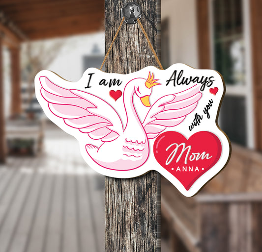 This Personalized Name Wood Sign is the perfect Mother's Day gift. It is a pink swan plywood sign with the words "I am always with you" etched into it. The customizable name ensures a special and meaningful touch.