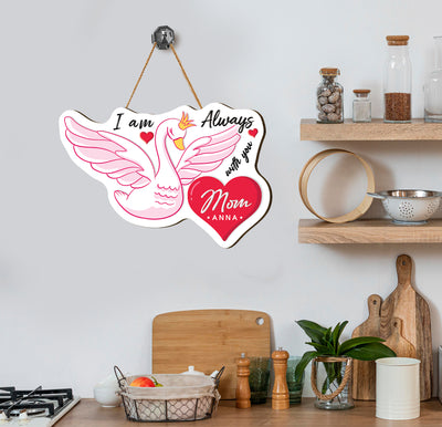 This Personalized Name Wood Sign is the perfect Mother's Day gift. It is a pink swan plywood sign with the words "I am always with you" etched into it. The customizable name ensures a special and meaningful touch.