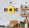 Celebrate Mother's Day with this high-quality, personalized wooden sign. Crafted with a sunflower template, this Mom Plywood Sign makes the perfect sentimental gift. Made from solid plywood, it's durable and sure to last. A thoughtful way to show appreciation and say “I love you.”