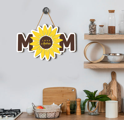 Celebrate Mother's Day with this high-quality, personalized wooden sign. Crafted with a sunflower template, this Mom Plywood Sign makes the perfect sentimental gift. Made from solid plywood, it's durable and sure to last. A thoughtful way to show appreciation and say “I love you.”