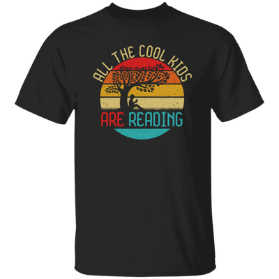 This vintage print t-shirt features a retro "All the Cool Kids are Reading" design that will make you stand out in any crowd. With a nod to nostalgia, this shirt is perfect for book lovers and trend-setters alike. Expertly crafted with high-quality materials, this shirt is both stylish and comfortable.