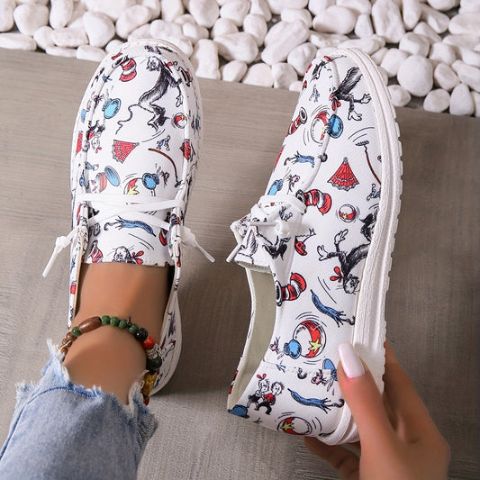 These comfortable women's canvas slip-on shoes feature a cheerful cartoon print, making them perfect for casual wear. The canvas uppers are lightweight and flexible yet sturdy, while the removable cushioned insoles provide excellent arch support and cushioning. Ideal for everyday wear.