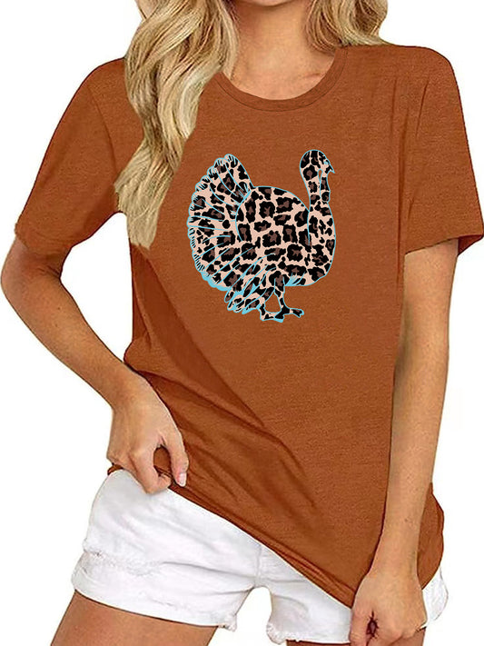 This stylish crew neck t-shirt features an eye-catching turkey leopard pattern, perfect for spring and summer. Its lightweight, breathable fabric makes it an essential fashion piece for any woman's wardrobe. Flattering, comfortable, and chic, this t-shirt is sure to make a statement.