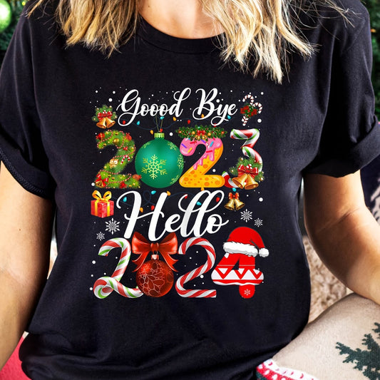 Bid farewell to 2023 in style with our 'Goodbye 2023, Hello 2024' Print T-Shirt! This trendy women's top is perfect for vacation with its casual short sleeves and eye-catching design. Embrace the new year with fashion and flair.