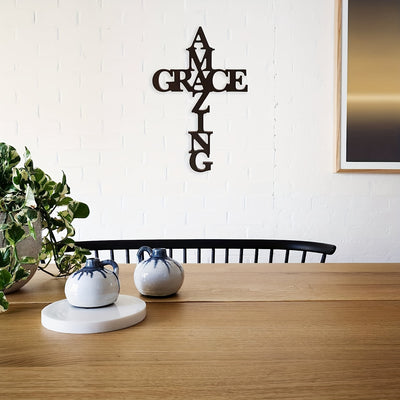 Enrich your home decor with this modern metal art wall hanging. The Faith Cross adds a unique touch to any room and is crafted from durable metal for longevity. A stylistic representation of faith, it's sure to add a meaningful accent to any living space.