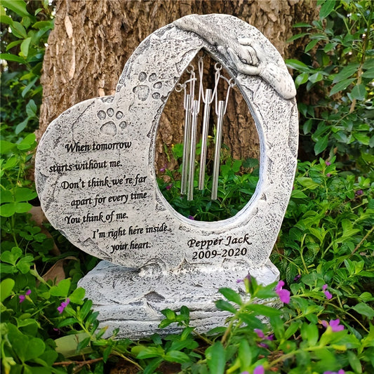 This personalized dog memorial stone from Heartfelt Tribute honors a beloved furry friend. The elegant angel wings design is laser-engraved into the stone, lasting a lifetime. Crafted with premium materials, this is a beautiful and lasting tribute to a pet's life and love.