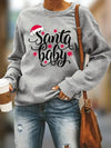 Get into the holiday spirit with our Santa Baby Letter Print Sweatshirt! This festive top features a classic crew neck and long sleeves, perfect for chilly days. The fun "Santa Baby" print adds a touch of cheer to any outfit. Stay cozy and stylish this season with this must-have piece for any woman's wardrobe.