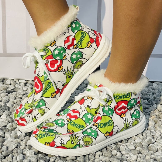 Stay cozy and stylish this winter in these fun Winter Wonderland cartoon Grinch print boots. Featuring an insulated design and supportive sole, they guarantee warmth and comfort with each step. Enjoy the compliments as you show off your unique fashion sense!