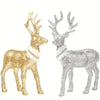 Elevate your holiday decor with our Glittering Golden and Silvery Standing Reindeer Decorations! These stunning tabletop additions will add a touch of winter magic to your space. Made with exquisite detailing and shimmering glitter, these reindeer will bring a sense of elegance and charm to your home. Perfect for any holiday setting.