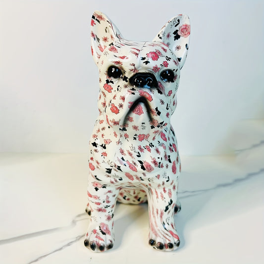 This spotted French Bulldog sculpture adds a touch of elegance and whimsy to any room. Handcrafted with exquisite detail, this statue is a charming addition to your home décor and makes a unique centerpiece. Each piece is carefully sculpted to capture the essence of this beloved breed.