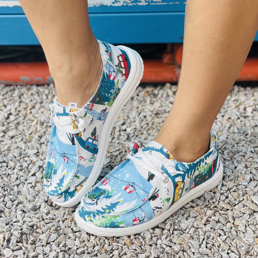 Celebrate the season with these festive women's canvas shoes featuring a bright and colorful cartoon pattern. Durably made and designed to last, these shoes are the perfect way to enjoy the Christmas season in style.
