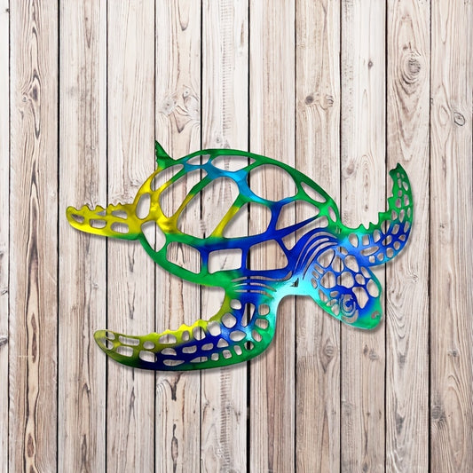 This delightful wall decor brings an air of whimsy and beauty to your home. The Whimsical Metal Art Turtle Wall Decor Plaque will add personality and character to your space and is crafted from durable metal to retain its luster for years. Its beautiful design captures the eye and ensures a unique addition to your home décor.