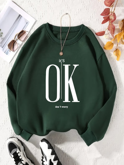 This plus size sweatshirt features a soft fleece interior lining and a stylish slogan print. Designed with comfort in mind, this lightweight and breathable piece offers effortless wearability. Enjoy the warmth and style of this cozy sweatshirt.