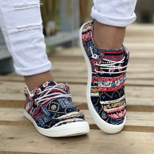 Step out in style with our Women's Tribal Geometric Print Canvas Shoes. Featuring a low-top design and lace-up closure, these comfortable walking shoes guarantee a secure fit. The round toe and tribal geometric print design add a touch of flair, making them perfect for everyday casual wear.