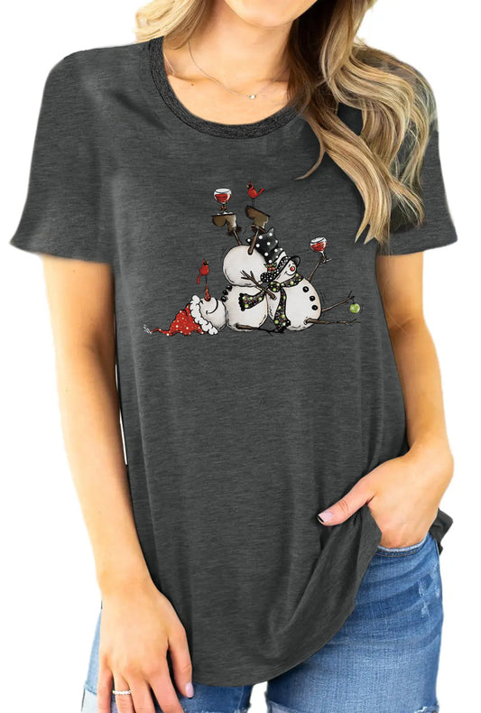 Frosty Chic: Snowman Print Tee is a stylish and comfortable addition to a woman's wardrobe. This crew neck t-shirt features a trendy snowman print detail on a soft, short-sleeve fabric. Perfect for casual wear, it is sure to be a statement piece that adds personality to any outfit.