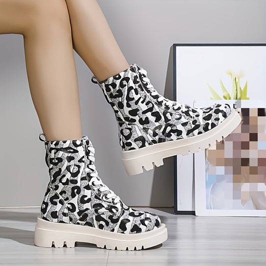 These modern leopard-print ankle boots combine style and comfort. Crafted from high-quality materials, they feature a lace-up design on a sculpted platform sole for extra height. Set new trends with these versatile boots!