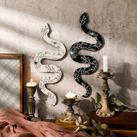 Enhance your living space with this beautiful Earthy Room Wall Decor. Featuring a black wooden snake, this piece adds a touch of natural, aesthetic charm to any room. Whether used as a desk or altar decor, or hung on a wall, this unique Boho piece will bring a sense of elegance and style to your apartment, bedroom, or living room. 