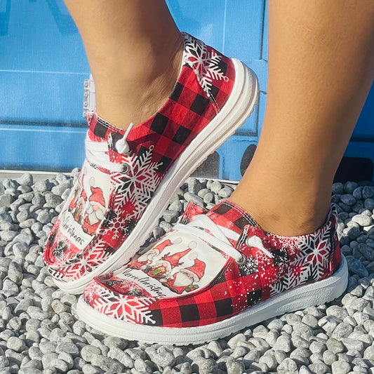 Stay comfortable and stylish this holiday season with this women's cartoon print canvas shoe. The lightweight and comfy slip-on design provides optimal comfort and flexibility. Made from robust canvas fabric, these shoes are sure to last the season.