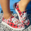 Fun and Festive: Women's Cartoon Print Canvas Shoes - Slip-On, Lightweight, and Comfy for the Holiday Season!