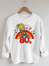 This Women's Made in the 80s & Cartoon Print Sweatshirt is crafted for comfort and style. Featuring a soft crew neck and a long sleeve silhouette, this sweatshirt is perfect for spring and fall days. The classic printed design provides timeless style.